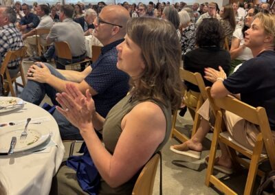 Guests applauded presenters during Mosaic’s 2026 More Than Medical Fundraising Luncheon.