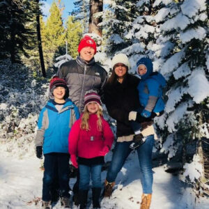 Dr Rebecca Hicks and her family in the snow
