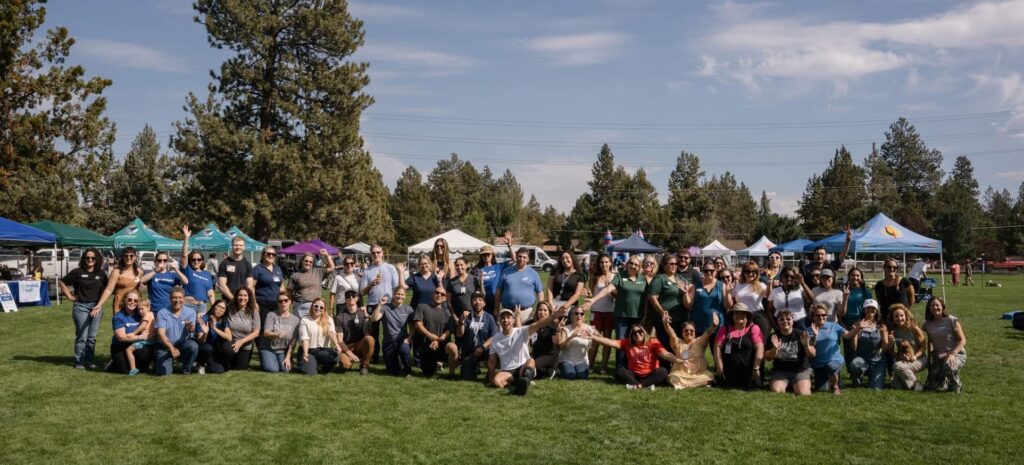 Health and Wellness Fair organizers and community partners pose together at Ponderosa Park in Bend.